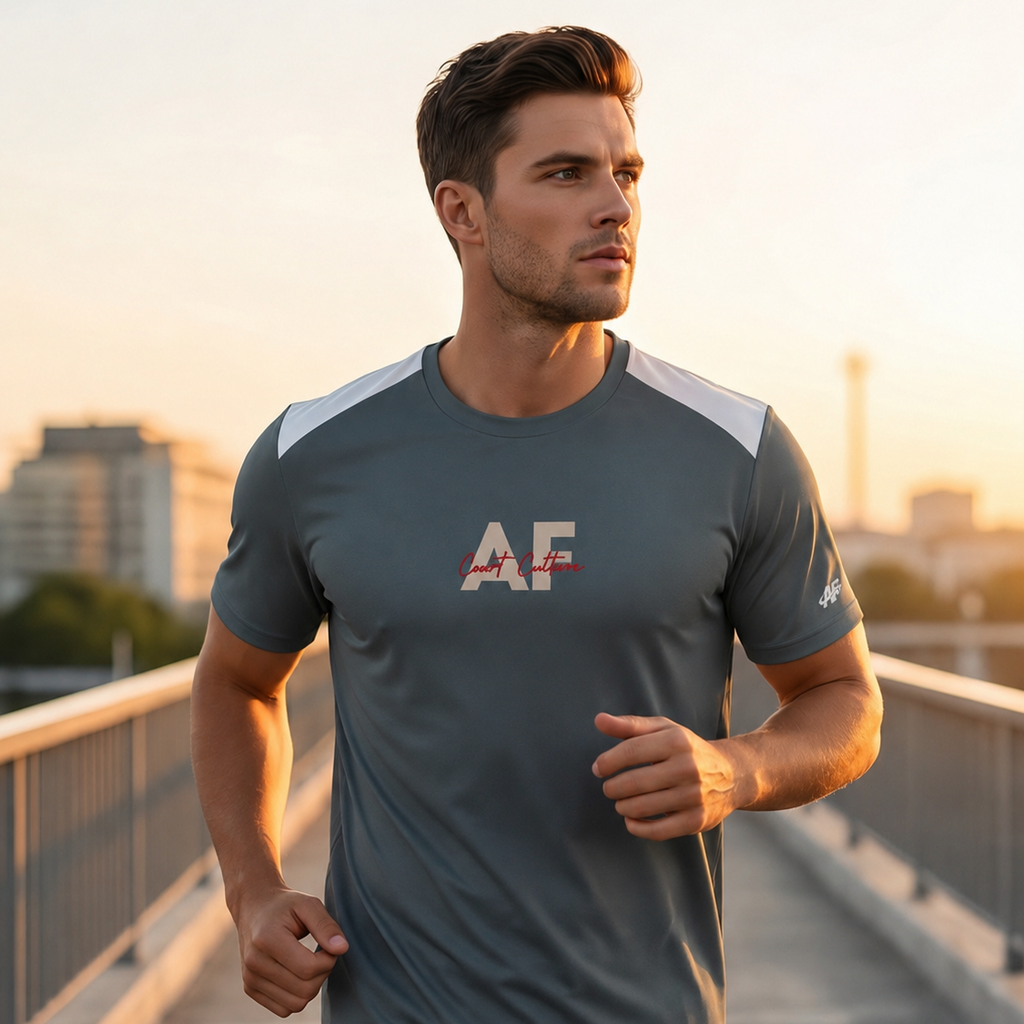 Man running on a bridge wearing a gray t-shirt with 'AF' logo