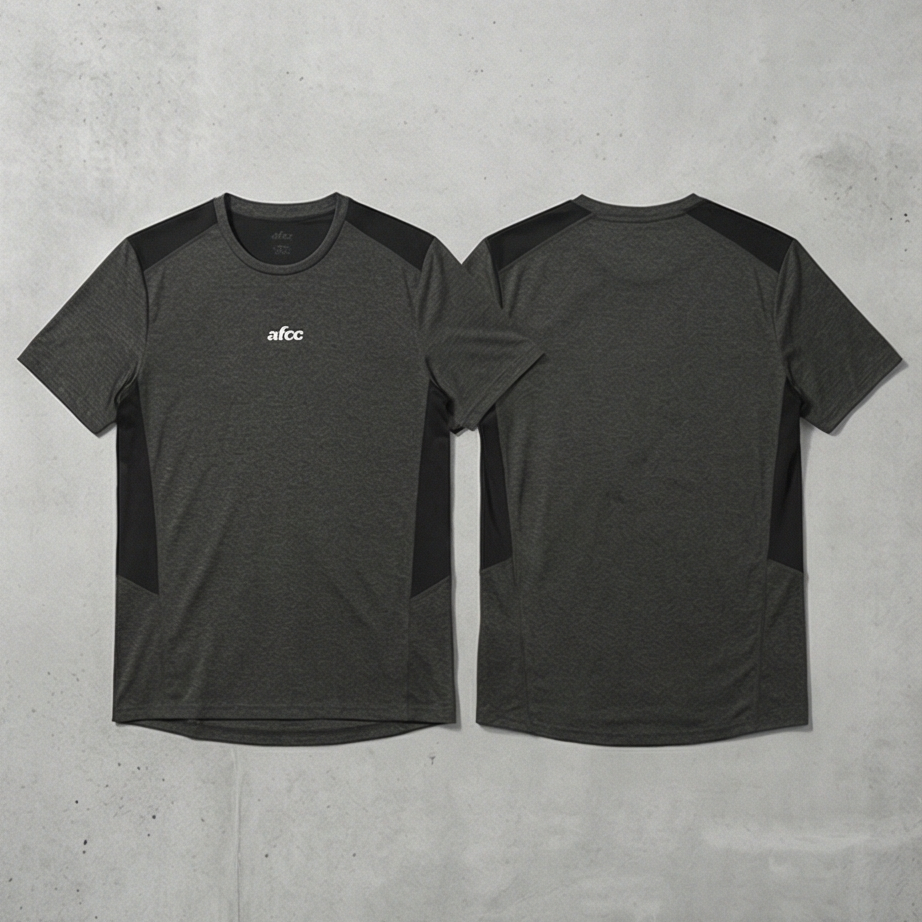 Black athletic shirt with contrasting sleeves on a gray concrete background
