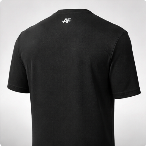 Black t-shirt with a logo on the back against a light gray background