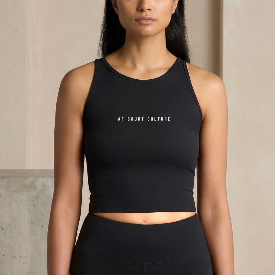 Woman wearing a black sports bra with 'AF COURT CULTURE' text against a neutral background