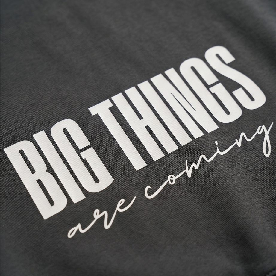 Text 'BIG THINGS are coming' on a black background