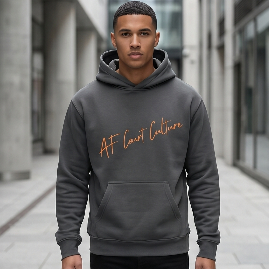 Man wearing a gray hoodie with 'AF Court Culture' text in an urban setting