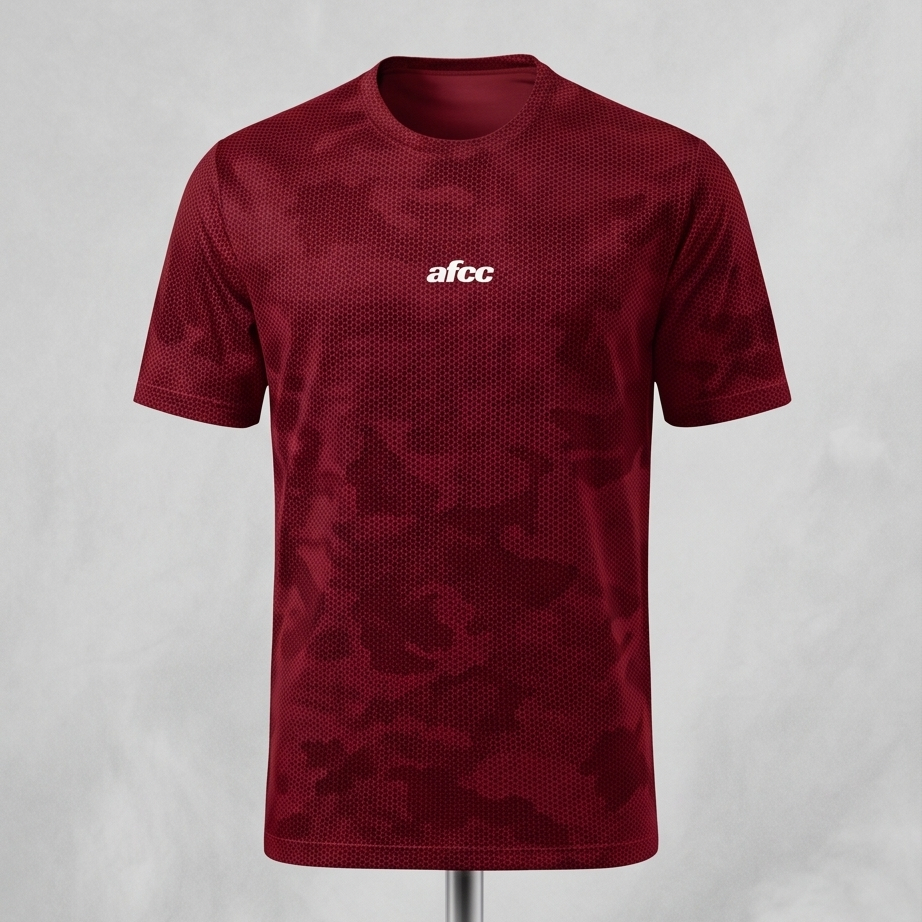 Maroon sports jersey with 'afcc' logo on a gray background