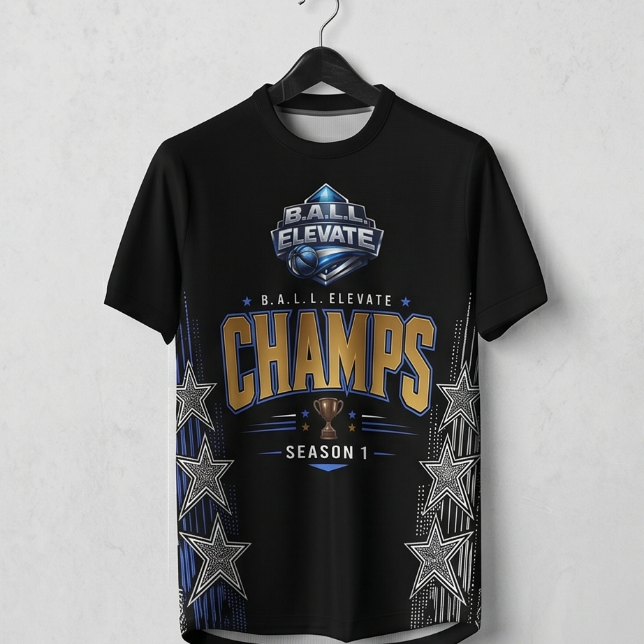 Black t-shirt with 'BALL Elevate CHAMPS' text and graphics on a hanger against a light gray background