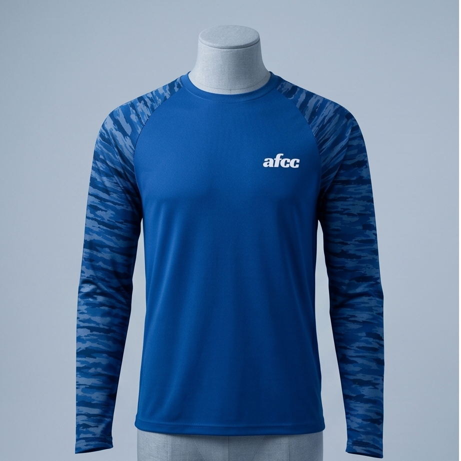 Blue athletic long-sleeve shirt with patterned sleeves on a mannequin against a gray background